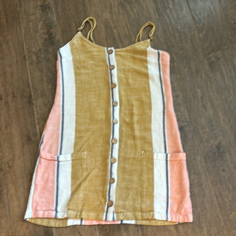 Rip curl mini, white, black, tan and peach color